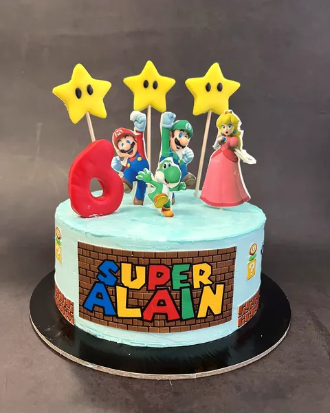 Tarta de Super Mario con estrellas y el 6