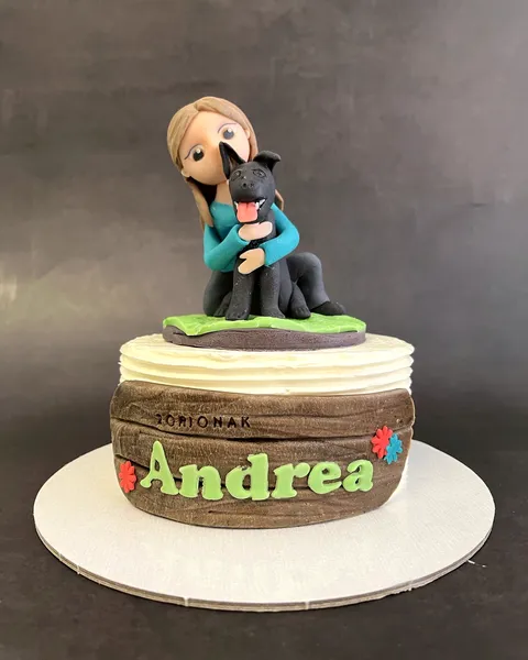 Tarta con figura abrazando a su perro