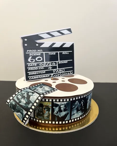 Tarta de cine con claqueta y el 60