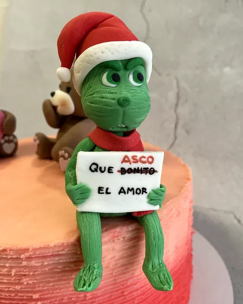 Grinch de fondant con cartel