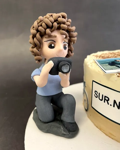 Fotógrafa de fondant con cámara